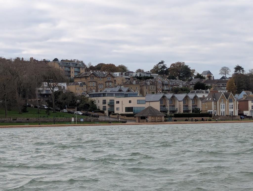 Lot: 28 - BLOCK OF THREE TWO-BEDROOM AND ONE THREE-BEDROOM FLATS WITH PARKING AND SEA VIEWS - View taken from the sea